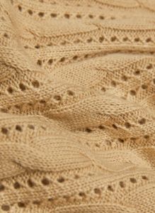 library sweater sold by Aritzia