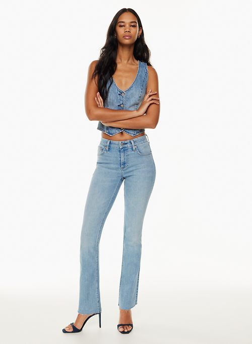 the 90s lexi lo-rise bootcut jean sold by Aritzia