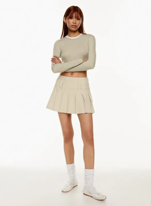 smarty pleated skirt sold by Aritzia