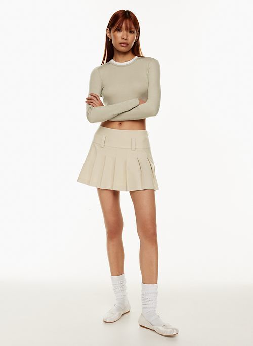smarty pleated skirt sold by Aritzia