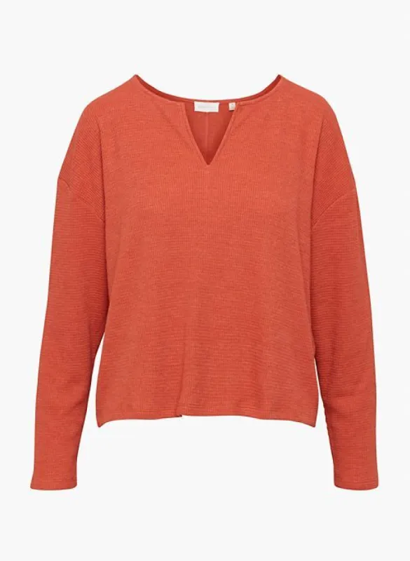 elevation thermal longsleeve sold by Aritzia