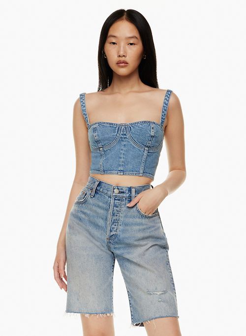 the 90s chloe mid-rise bermuda jean short sold by Aritzia