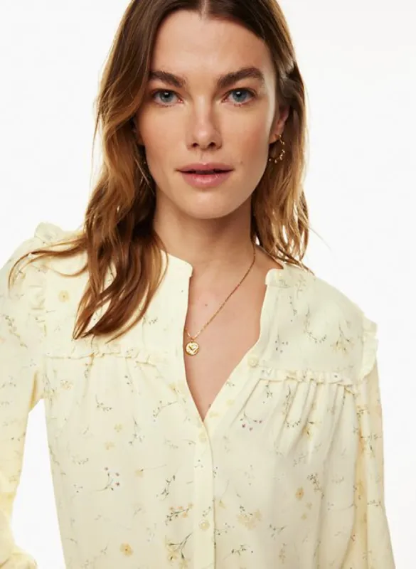 nimbus blouse sold by Aritzia