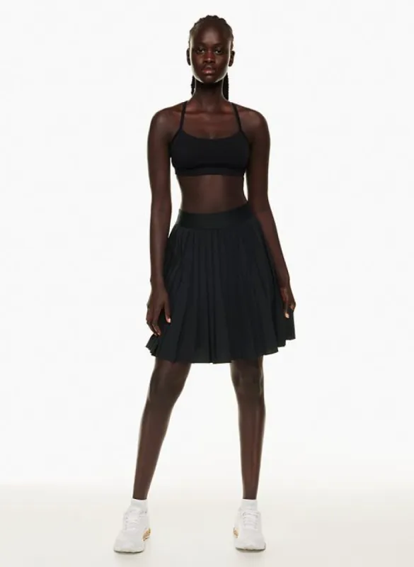 tnamove™ tennis pro knee skirt sold by Aritzia