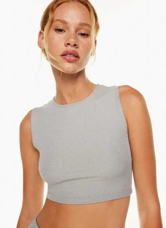 tnaflow™ cropped muscle tank sold by Aritzia