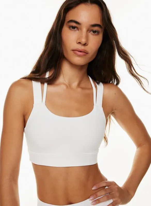 tnaslick™ cycle sports bra sold by Aritzia