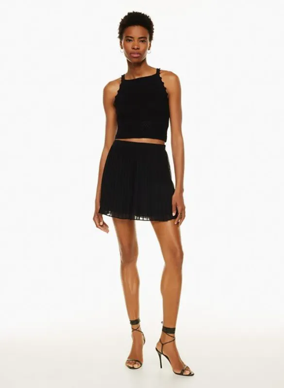 twirl mini pleated skirt sold by Aritzia
