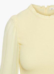 tempest blouse sold by Aritzia
