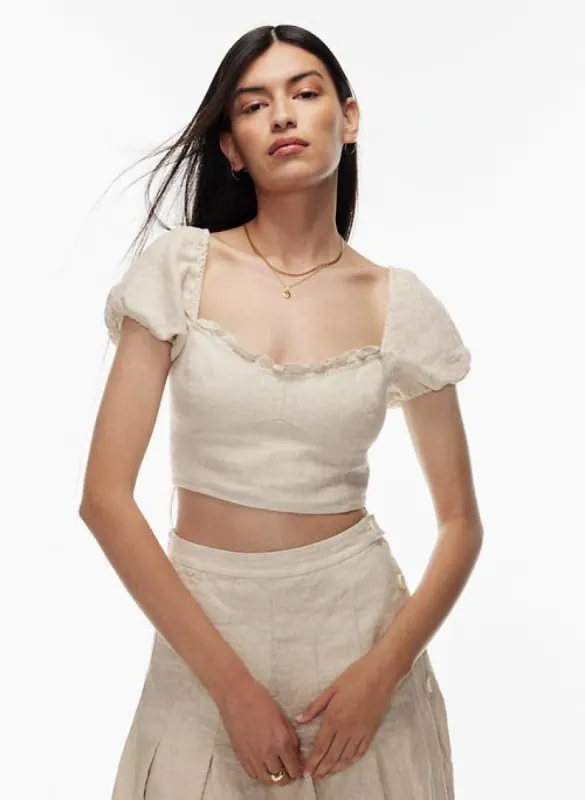 wander linen blouse sold by Aritzia