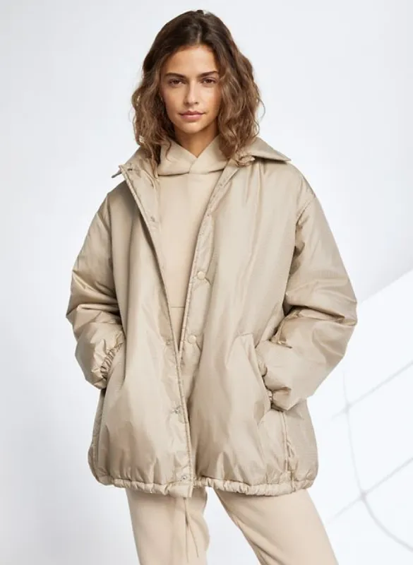 coaches jacket sold by Aritzia