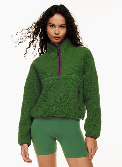 bigfoot polar ½ zip sweater sold by Aritzia