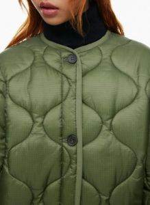 evergreen quilted jacket sold by Aritzia