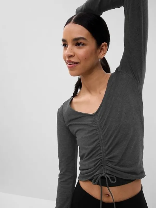 GapFit Brushed Jersey Cropped Cinch T-Shirt sold by GAP