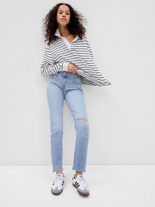 Mid Rise Classic Straight Jeans sold by GAP