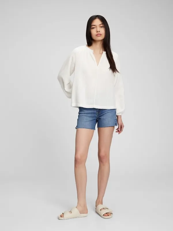 Crinkle Gauze Ruffle Neck Top sold by GAP