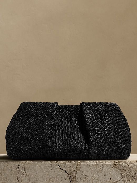 Riviera Raffia Clutch sold by Banana Republic