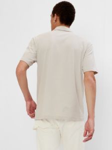 Pocket Polo Shirt sold by GAP