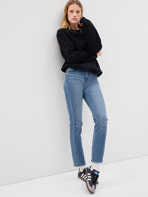 Mid Rise Classic Straight Jeans sold by GAP