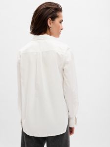 Eyelet Ruffle Perfect Shirt sold by GAP