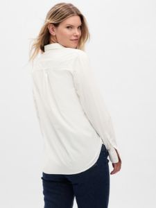 Eyelet Ruffle Perfect Shirt sold by GAP