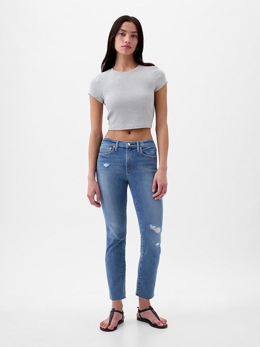 Mid Rise Vintage Slim Jeans sold by GAP