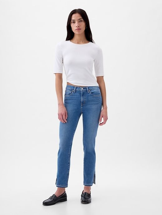 Mid Rise Vintage Slim Jeans sold by GAP
