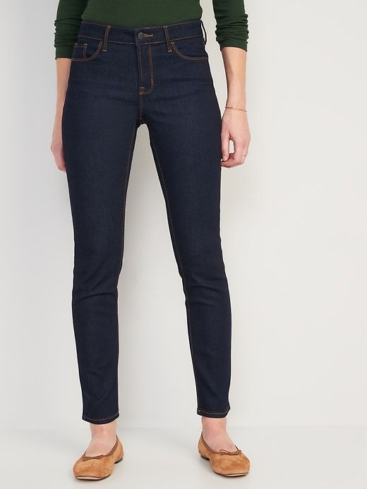 Mid-Rise Power Slim Straight Jeans for Women sold by GAP