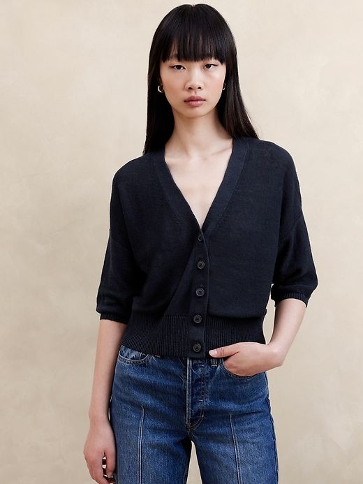 ボタンライクカーディガンtresor by lana