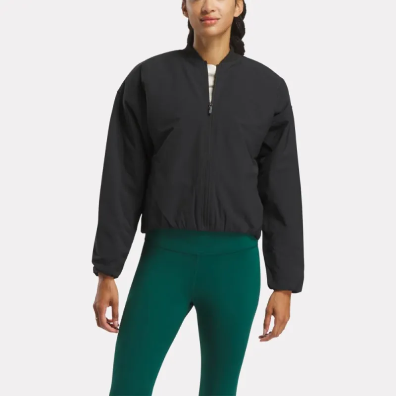 Reebok Apparel Women Active Collective SkyStretch Woven Padded Jacket BLACK sold by Reebok