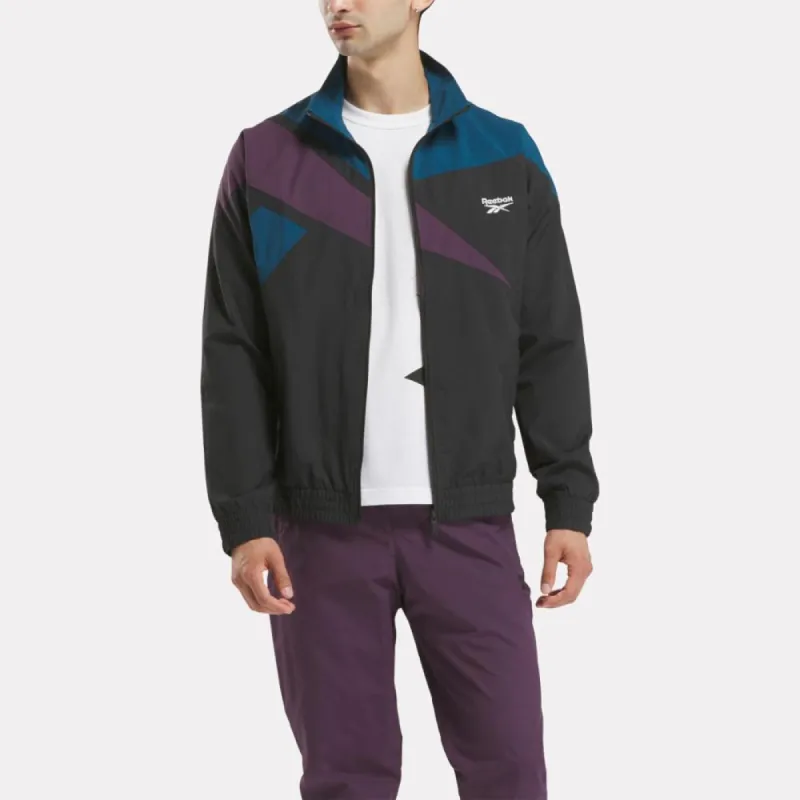 Reebok Apparel Men Classics Vector Track Jacket BLACK/MIDNIGHT PLUM sold by Reebok