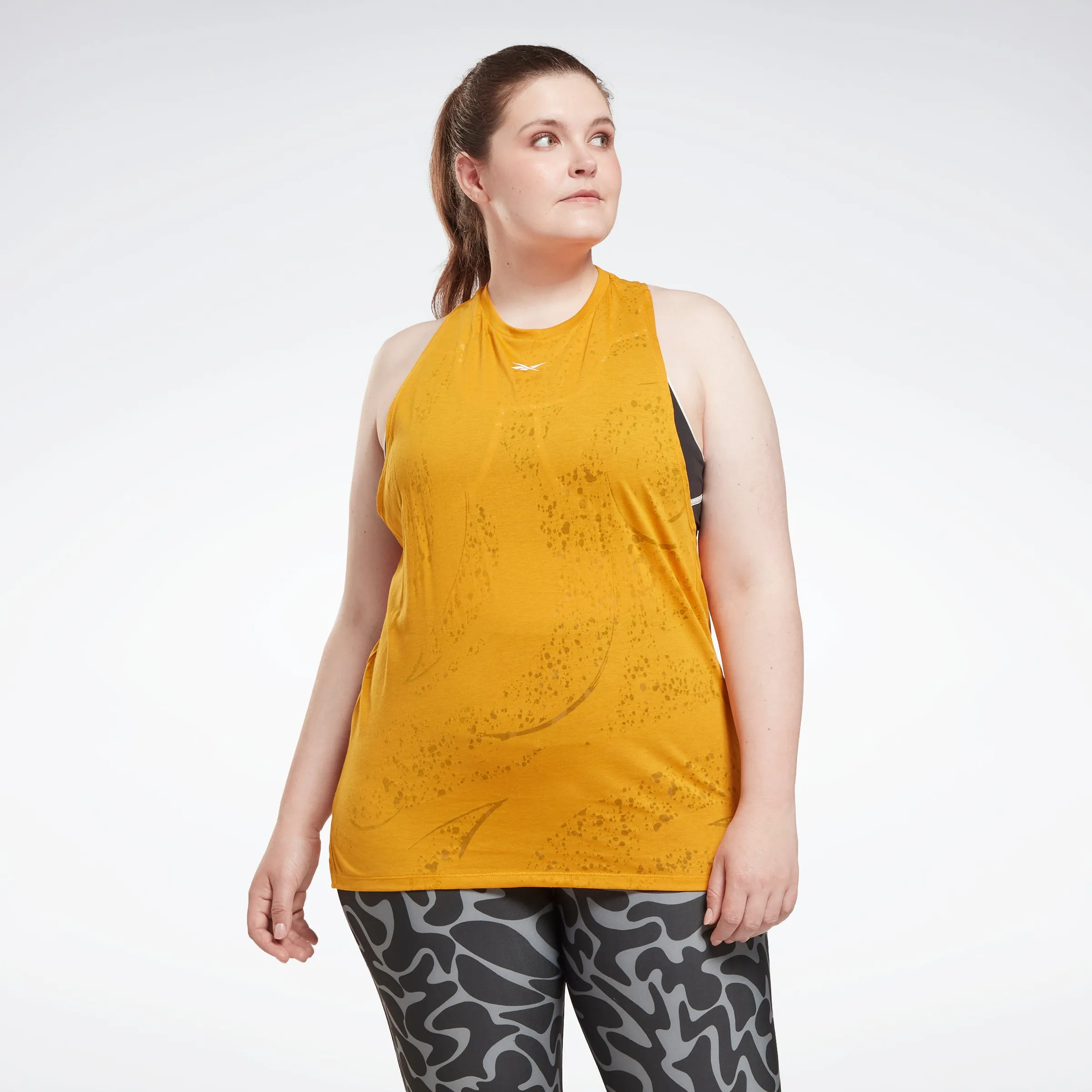 Reebok Apparel Women Burnout Tank Top (Plus Size) Bright Ochre sold by Reebok
