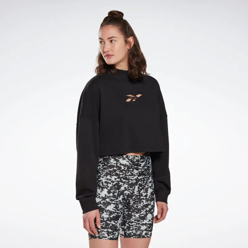 Reebok Apparel Women Studio Vector Knit Crew Sweatshirt Black made by Reebok