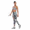 Reebok Apparel Women Lux Strappy Allover Print Bold Bra PUGRY3 sold by Reebok