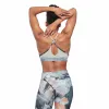 Reebok Apparel Women Lux Strappy Allover Print Bold Bra PUGRY3 sold by Reebok