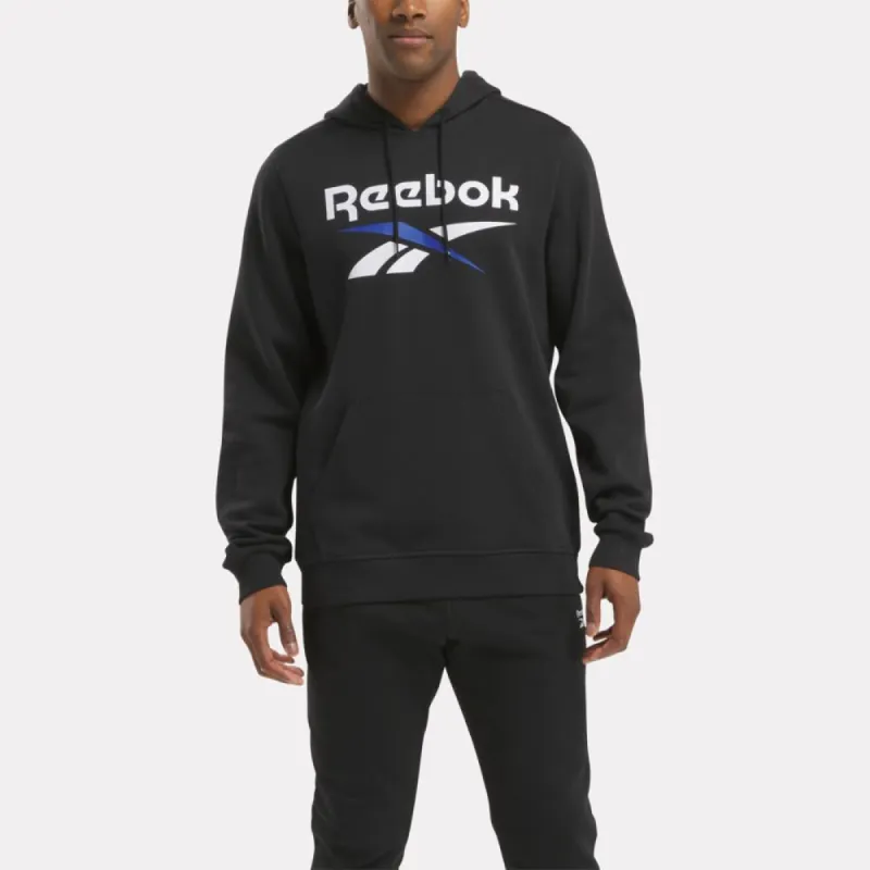 Reebok Apparel Men Reebok Identity Fleece Stacked Logo Pullover Hoodie BLACK/BOUNDLESS BLUE sold by Reebok