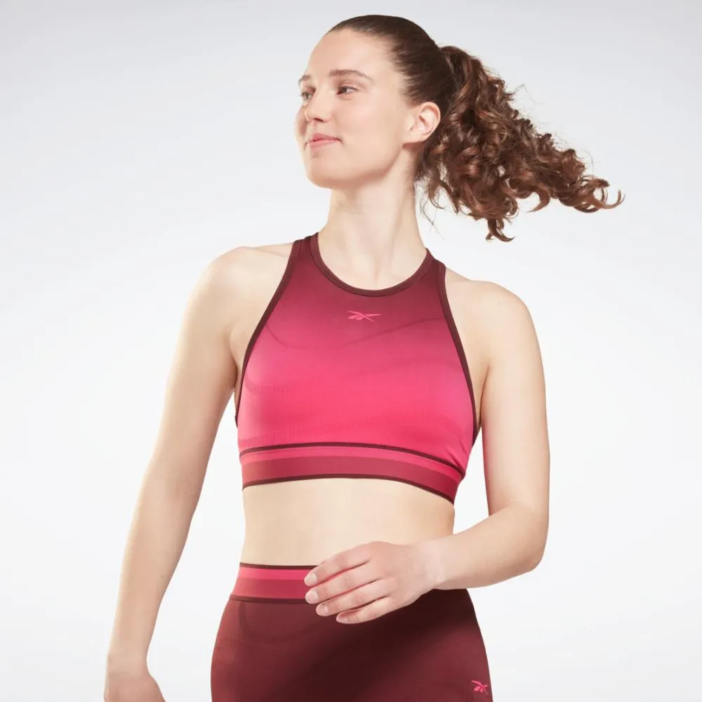 Reebok Apparel Women United By Fitness Seamless Crop Top MAROON/PURPNK sold by Reebok