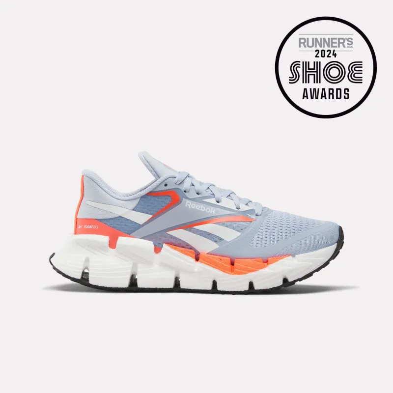 Reebok Footwear Women Floatzig 1 Shoes PALBLU/FTWWHT/ORGFLA made by Reebok