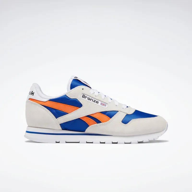 Reebok Footwear Men Bronze 56K Classic Leather Shoes Chalk/Clacob/Slaora sold by Reebok