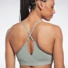 Reebok Apparel Women Reebok Lux Strappy Sports Bra HARGRN sold by Reebok