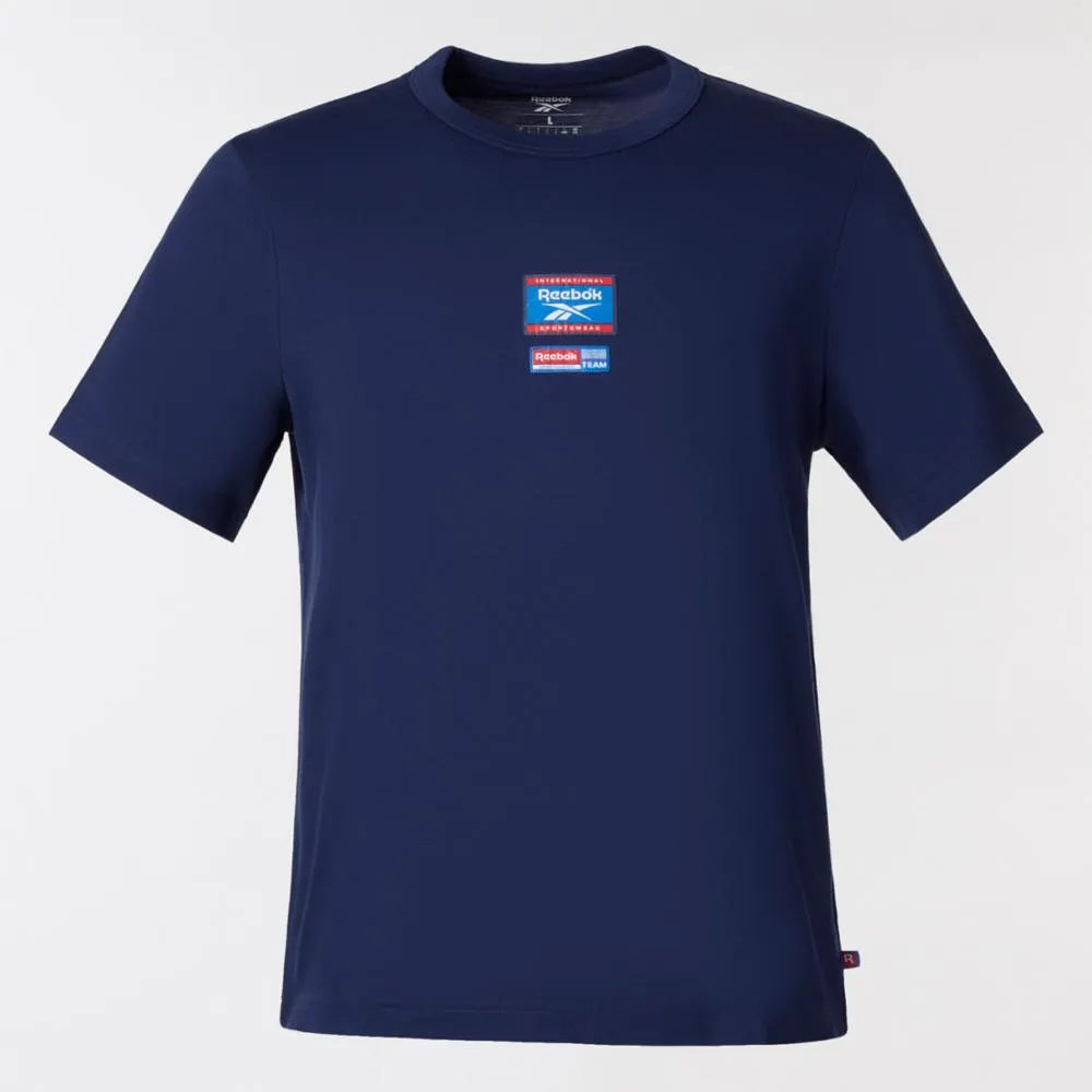 Reebok Apparel Men Reebok Identity Badge T-Shirt VECTOR NAVY sold by Reebok