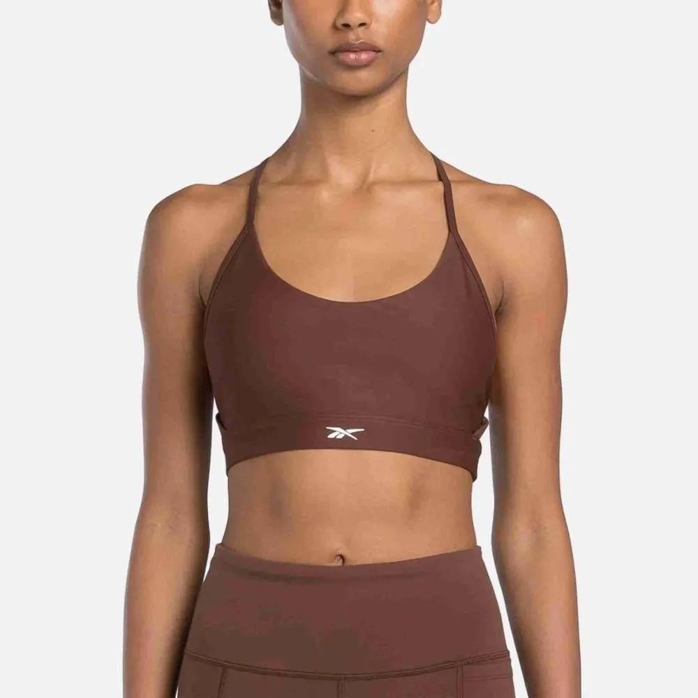 Reebok Apparel Women Lux Strappy Sports Bra UNEARTHED BROWN sold by Reebok