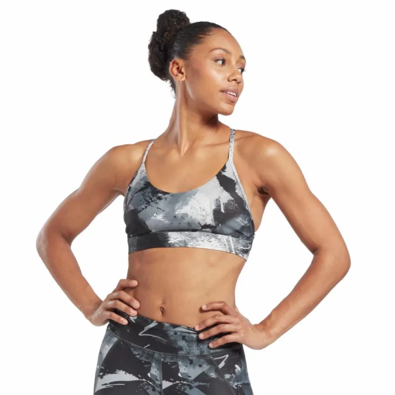 Reebok Apparel Women Lux Strappy All Over Print Bold Bra BLACK sold by Reebok