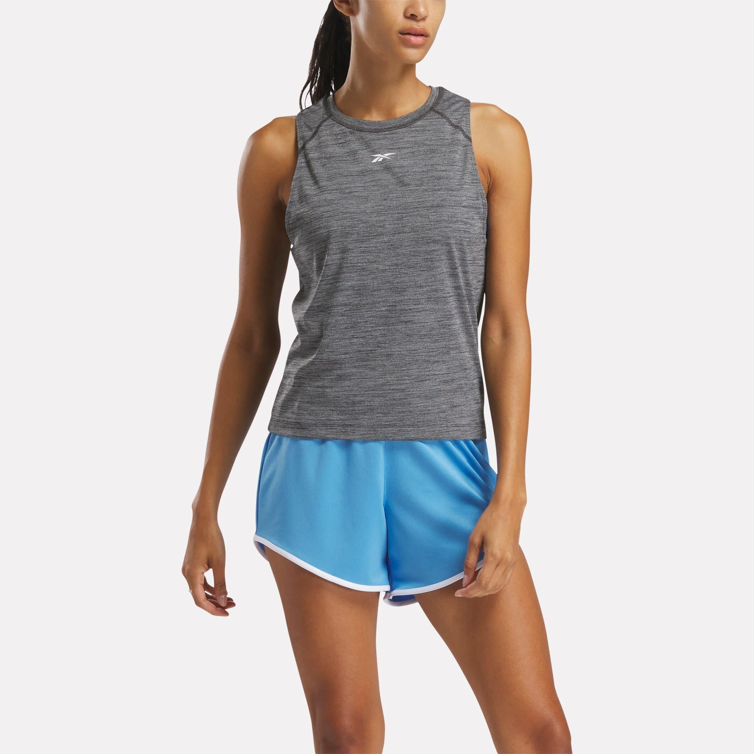 Reebok Apparel Women ID Train Tank Top NGHBLK sold by Reebok