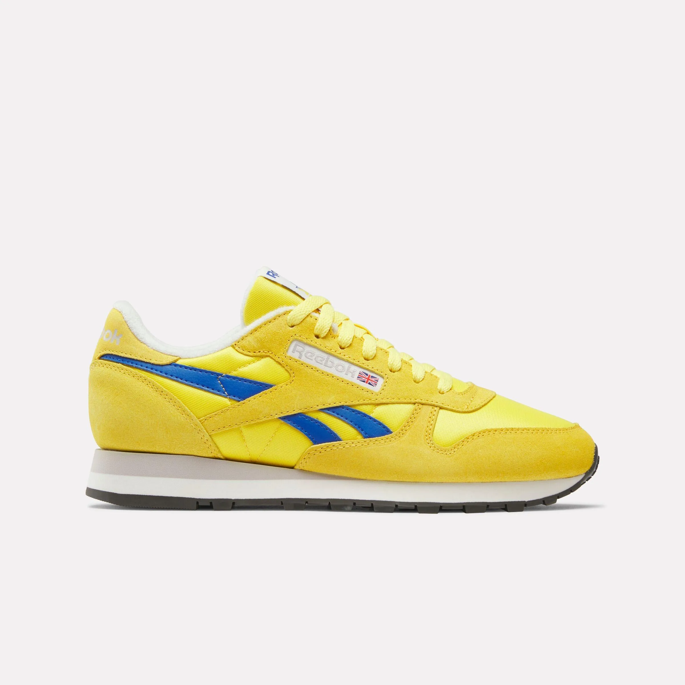 Reebok Footwear Men Classic Leather Shoes GOLDEN HAZE/OPTIMUM BLUE/CHALK sold by Reebok