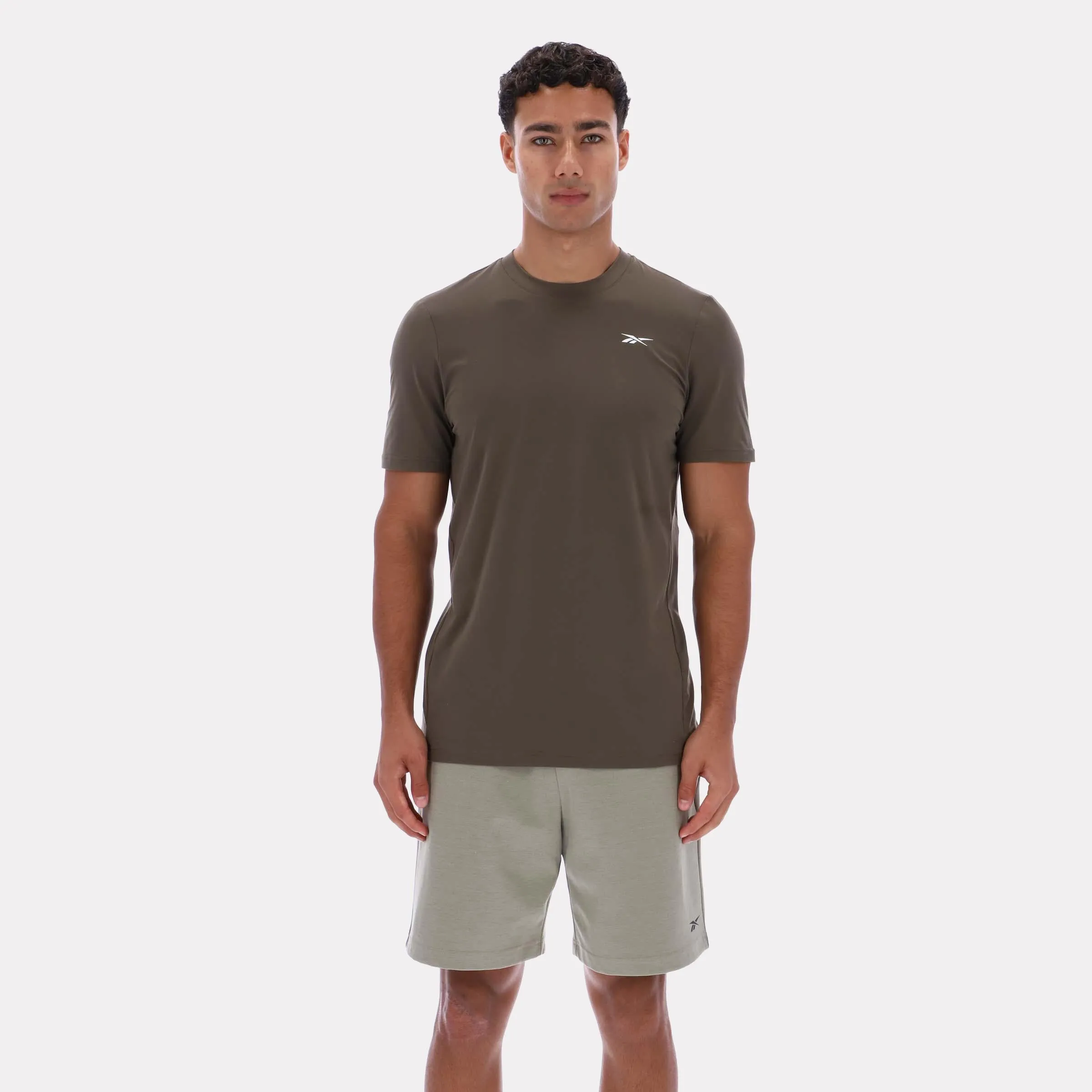 Reebok Apparel Men Core Move T-Shirt ARMY GREEN sold by Reebok