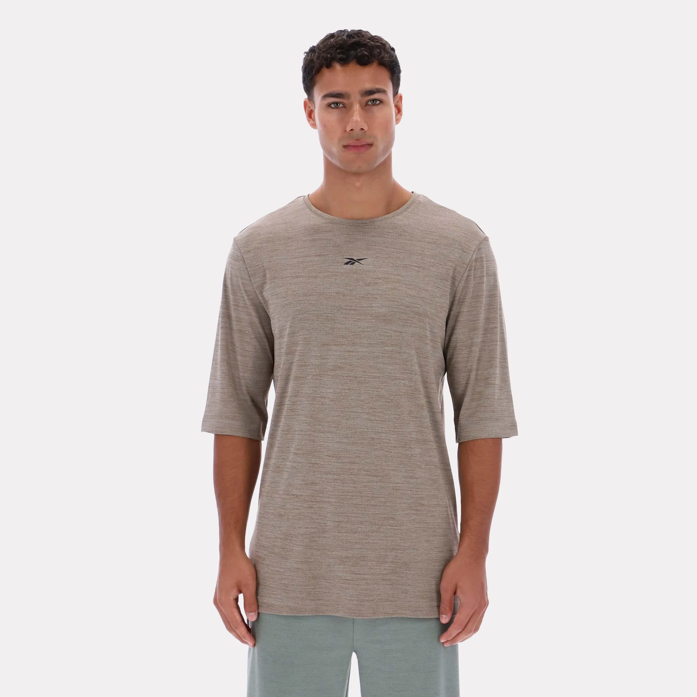 Reebok Apparel Men Relaxed Long Sleeve Yoga T-Shirt GRITTY GREY MARL sold by Reebok