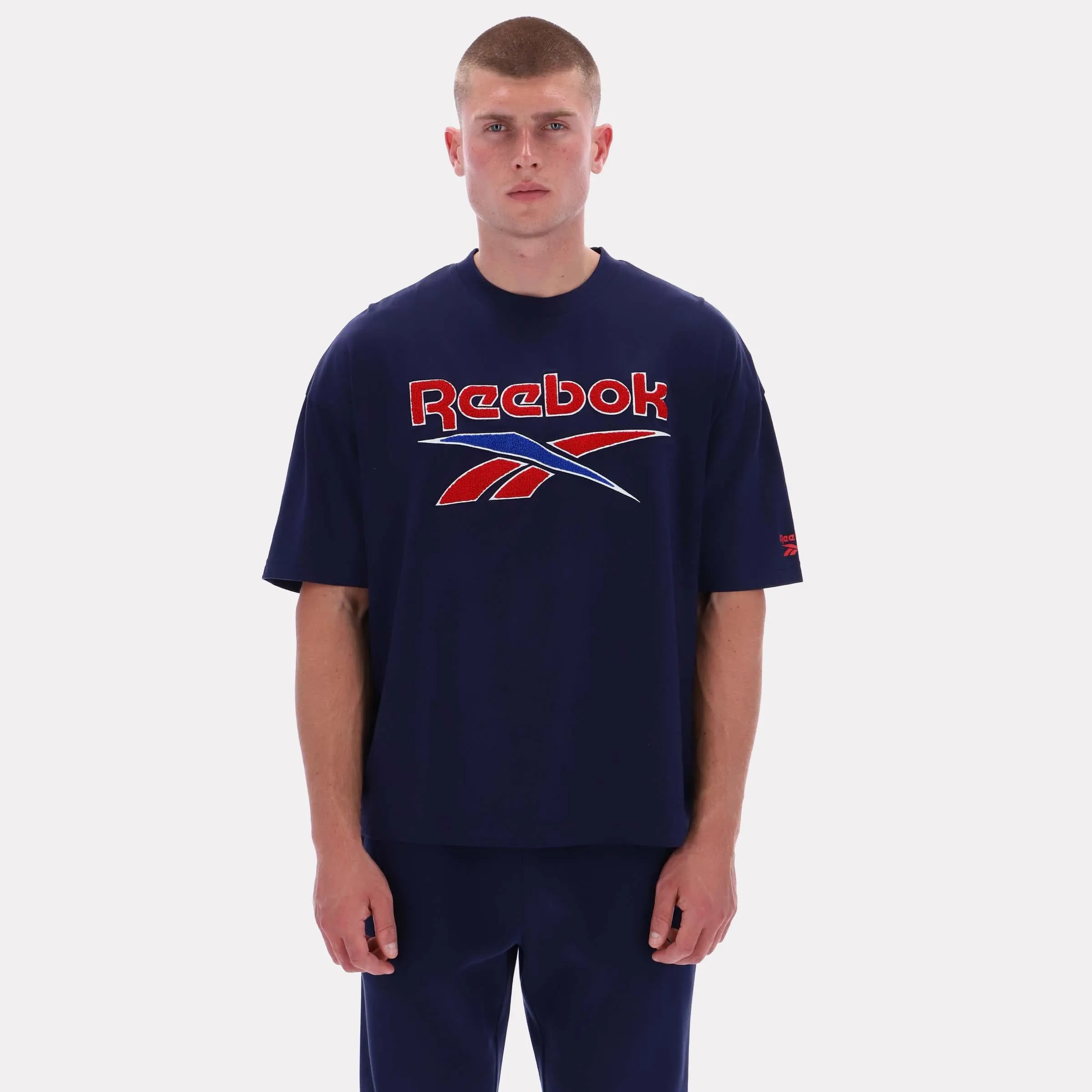 Reebok Apparel Men Reebok Varsity Graphic T-Shirt VECTOR NAVY sold by Reebok
