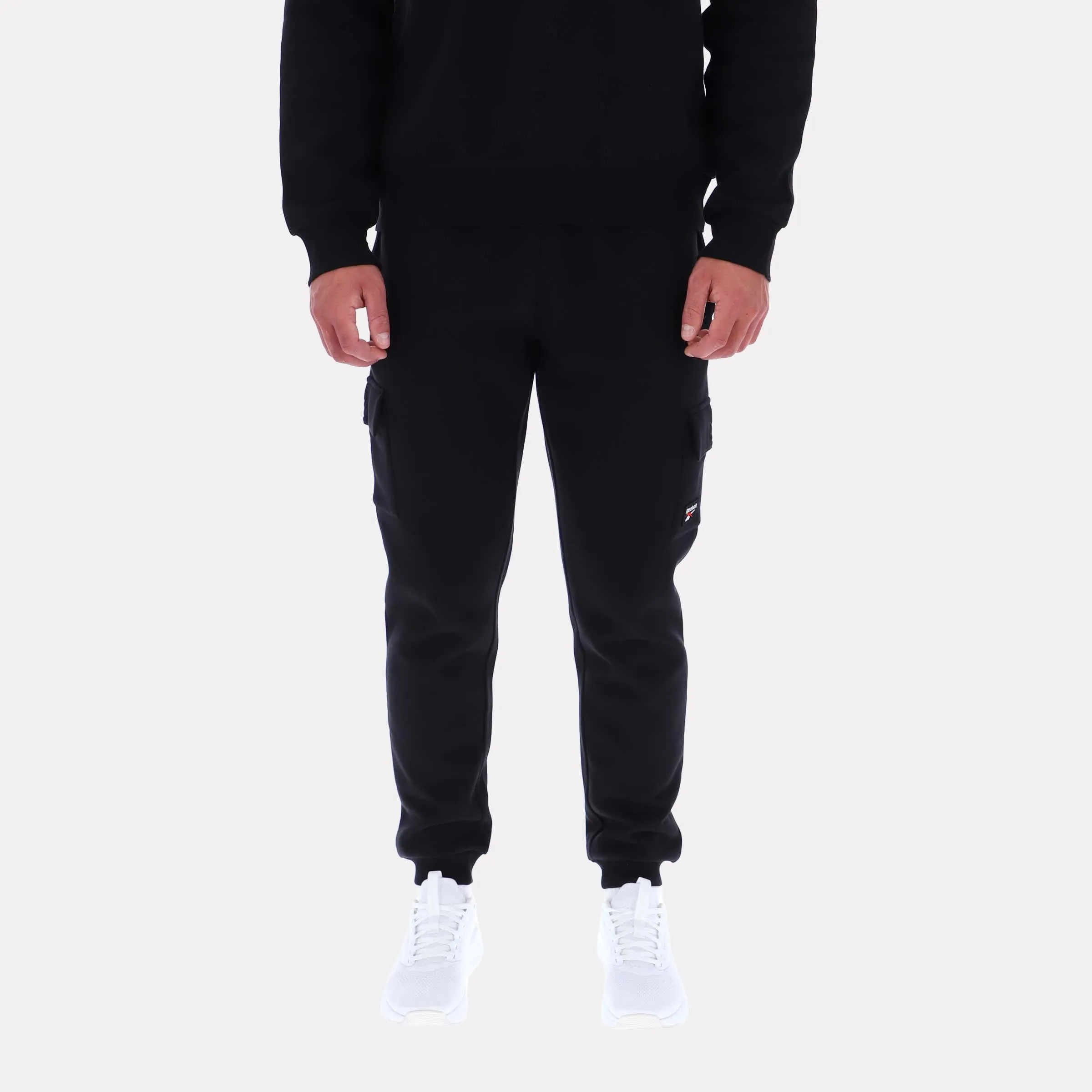 Reebok Apparel Men Reebok Cargo Pocket Cuffed Pants BLACK sold by Reebok