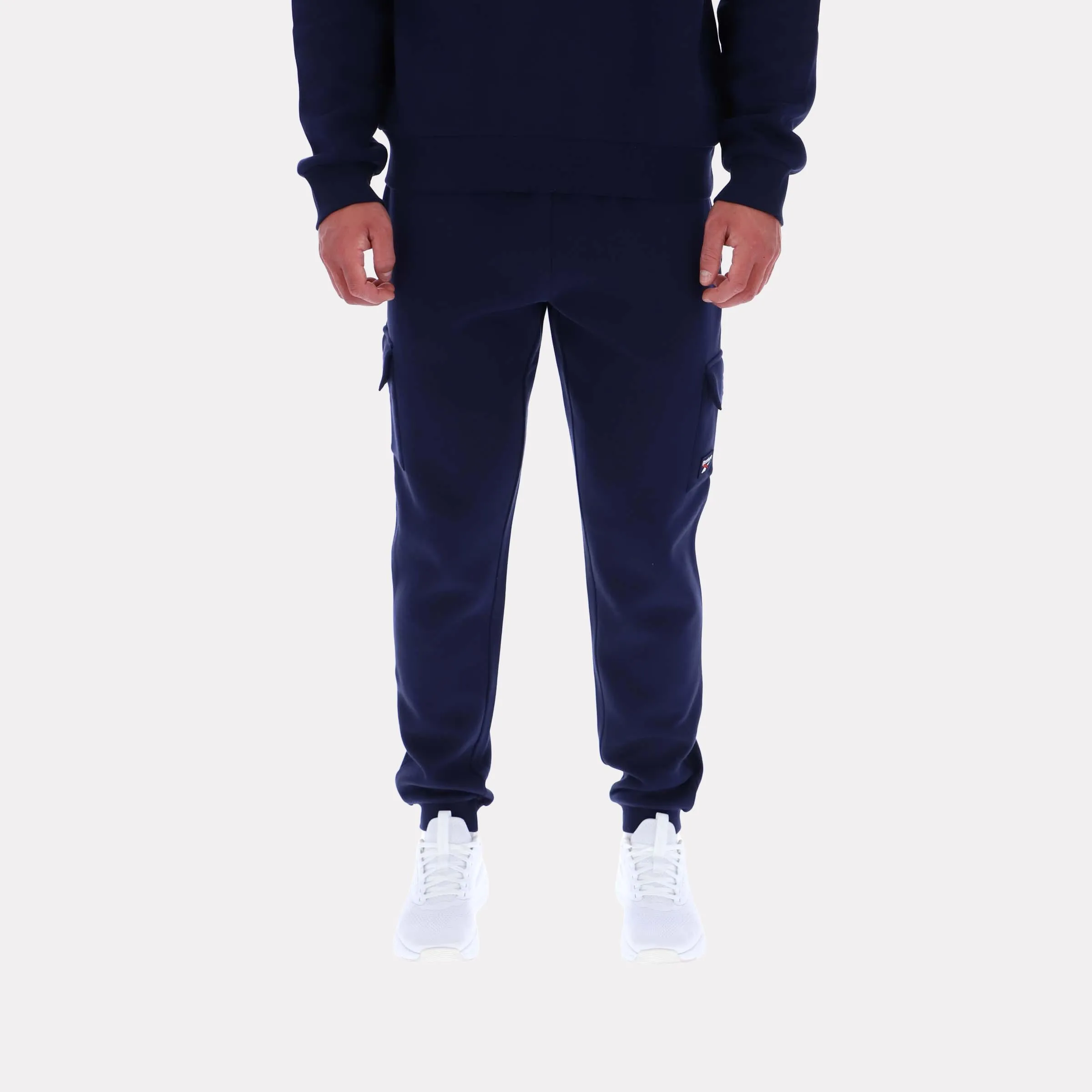 Reebok Apparel Men Reebok Cargo Pocket Cuffed Pants VECTOR NAVY sold by Reebok