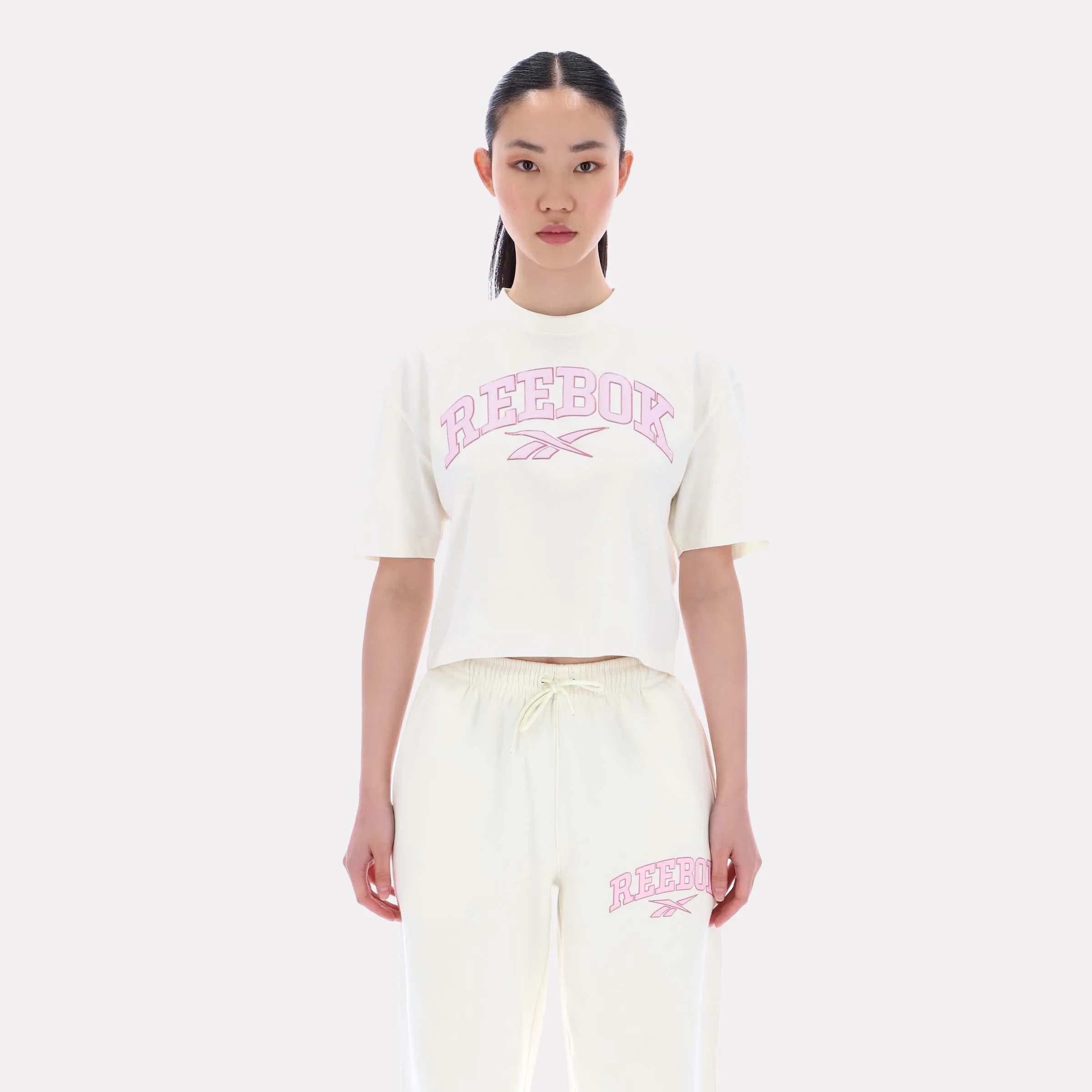 Reebok Apparel Women Varsity Logo Cropped T-Shirt VINTAGE CHALK sold by Reebok